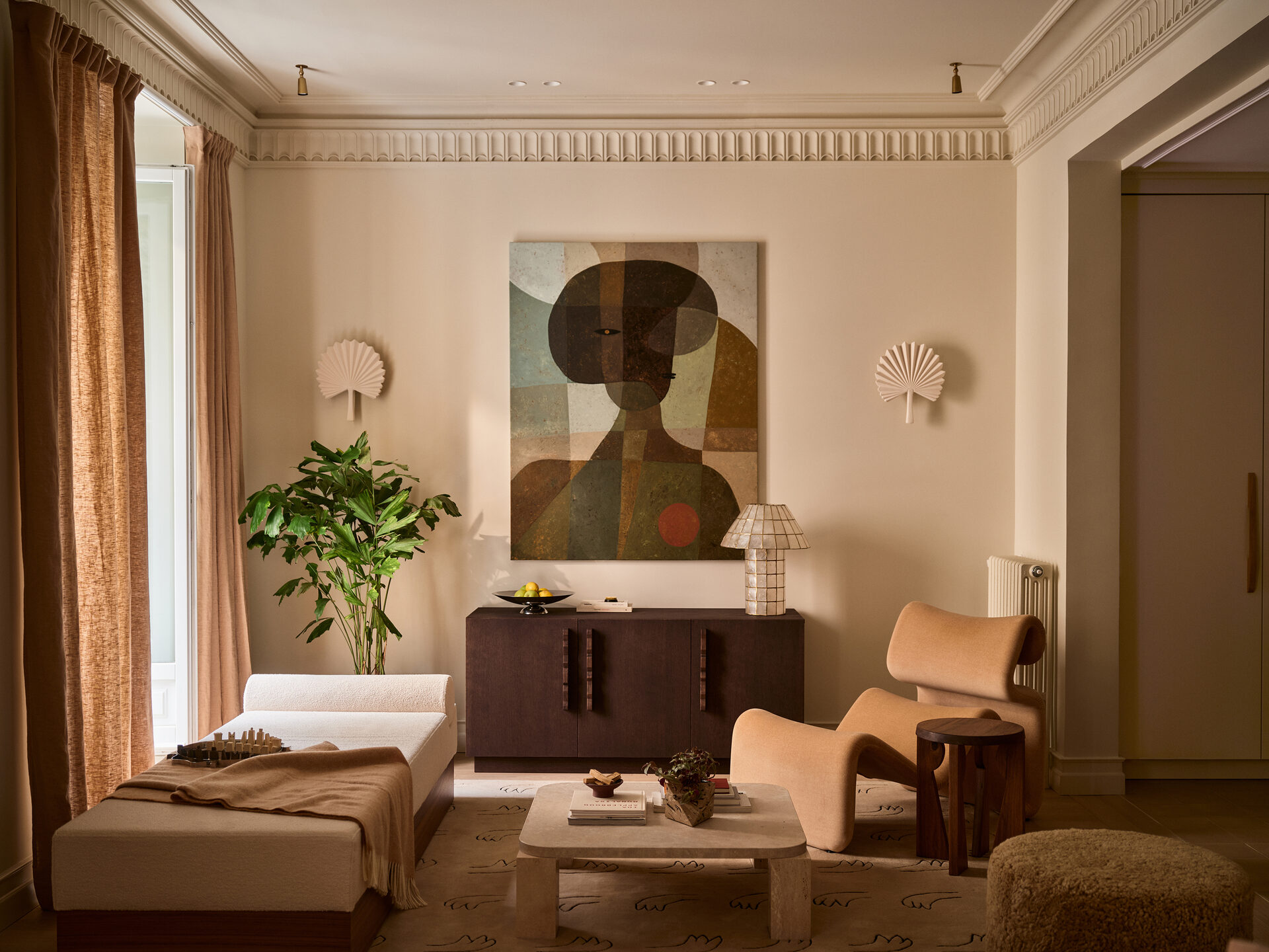 Reception room with painting and sideboard