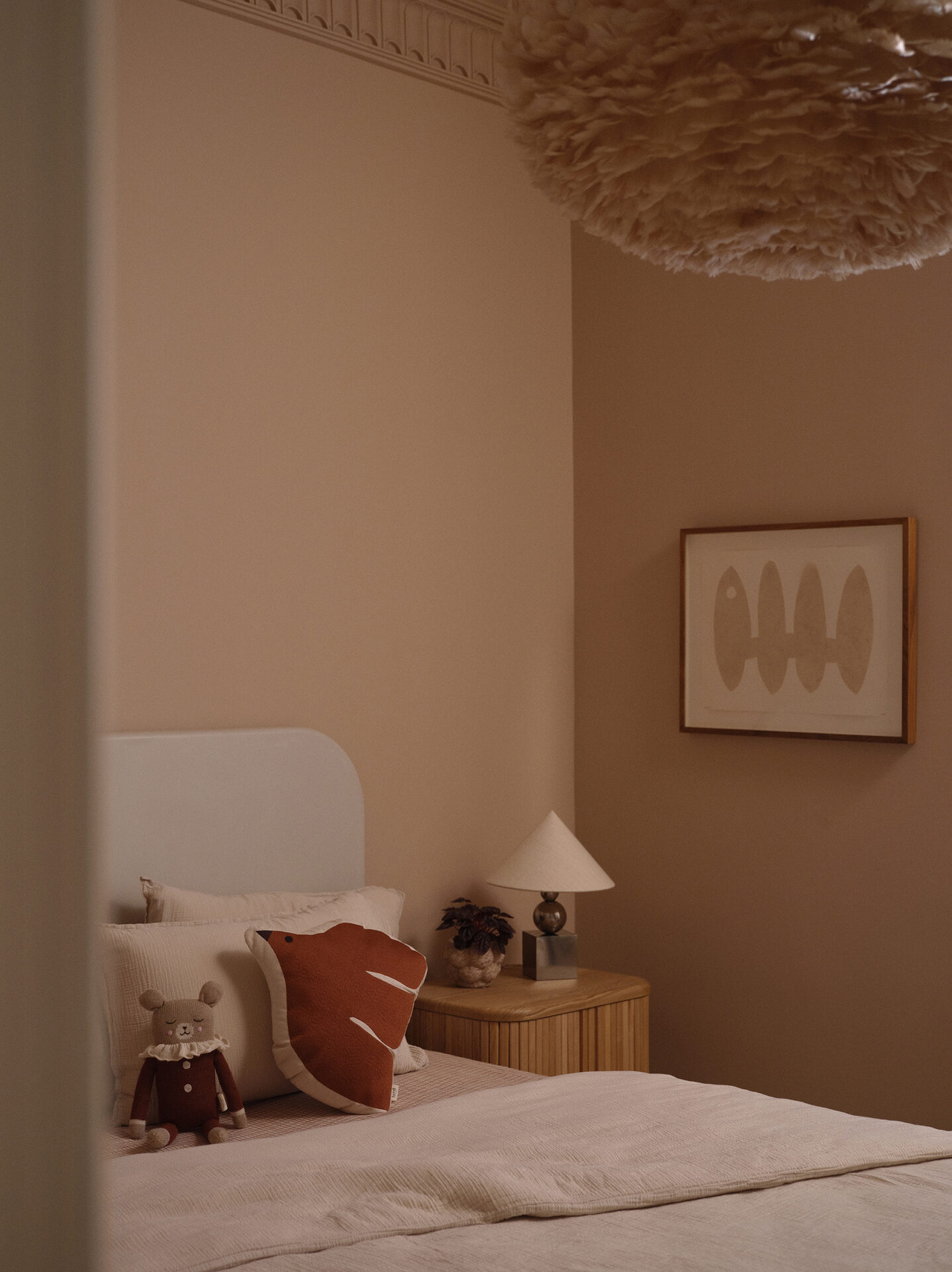 Third bedroom with sculpted headboard